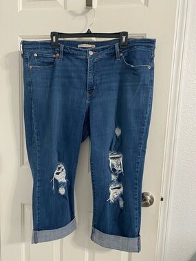 Levi's Dark Blue Distressed Ankle Jeans
